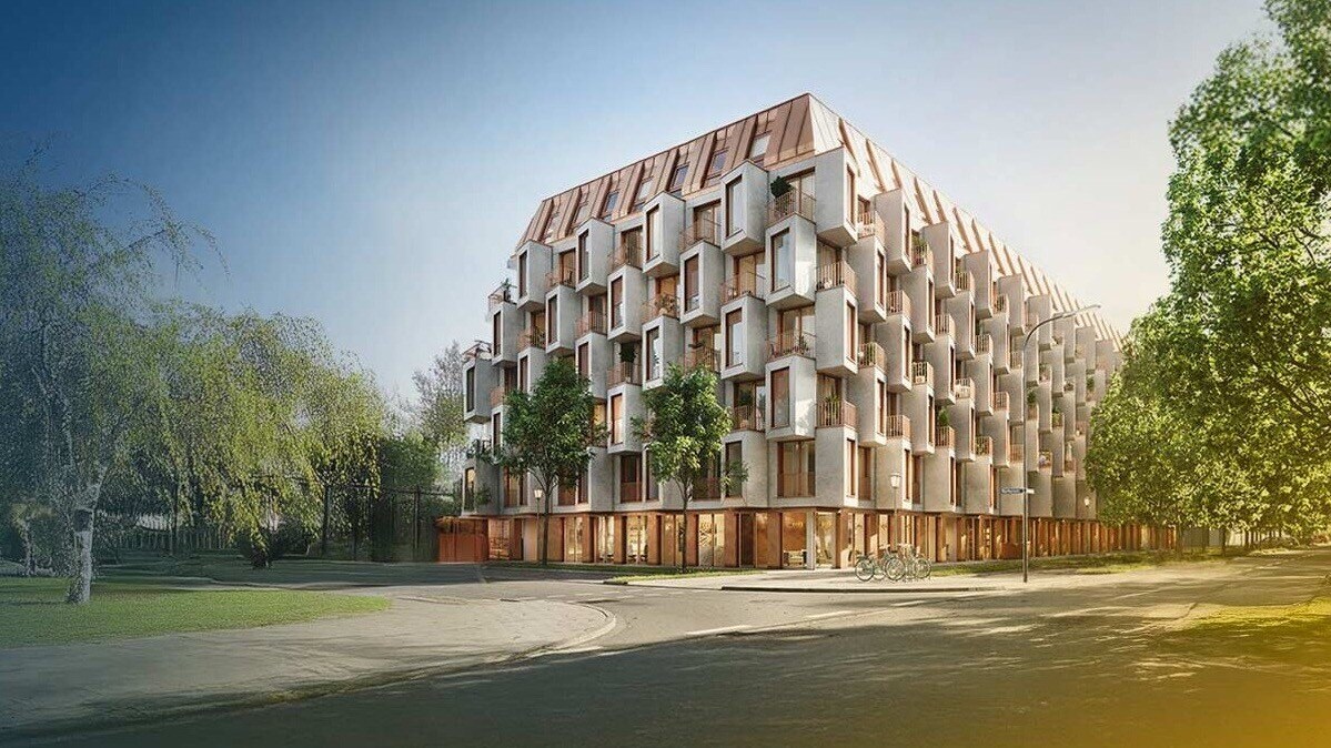 Modern building next to a park and trees