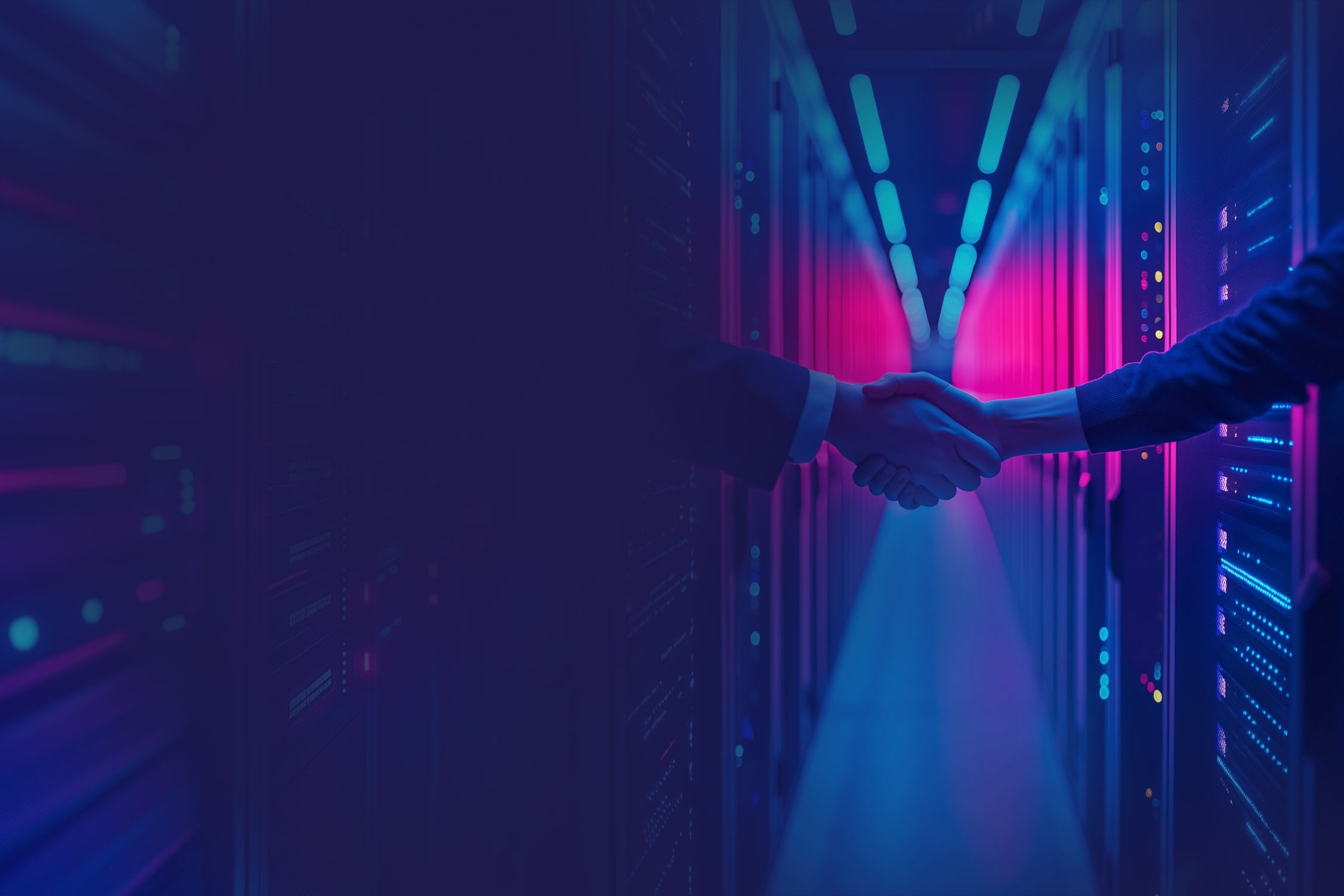 Handshake between two business partners in a server room, symbolizing the successful implementation of software consulting projects