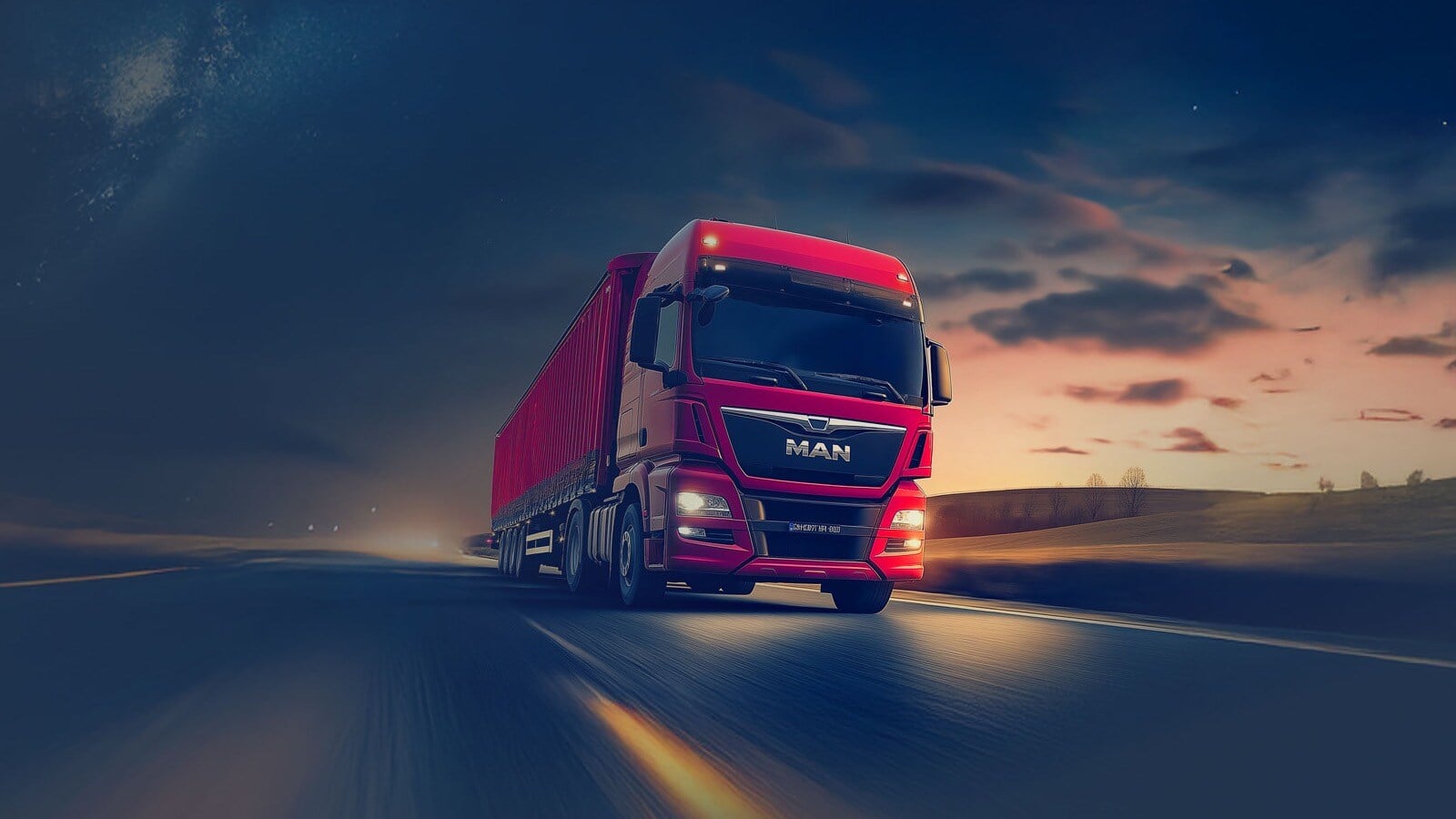 A red MAN truck drives along an empty road under a clear night sky with shining stars.