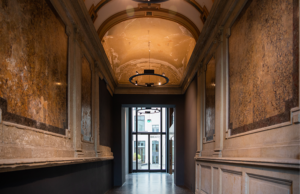 Entrance door and old building hallway of our Berlin office.